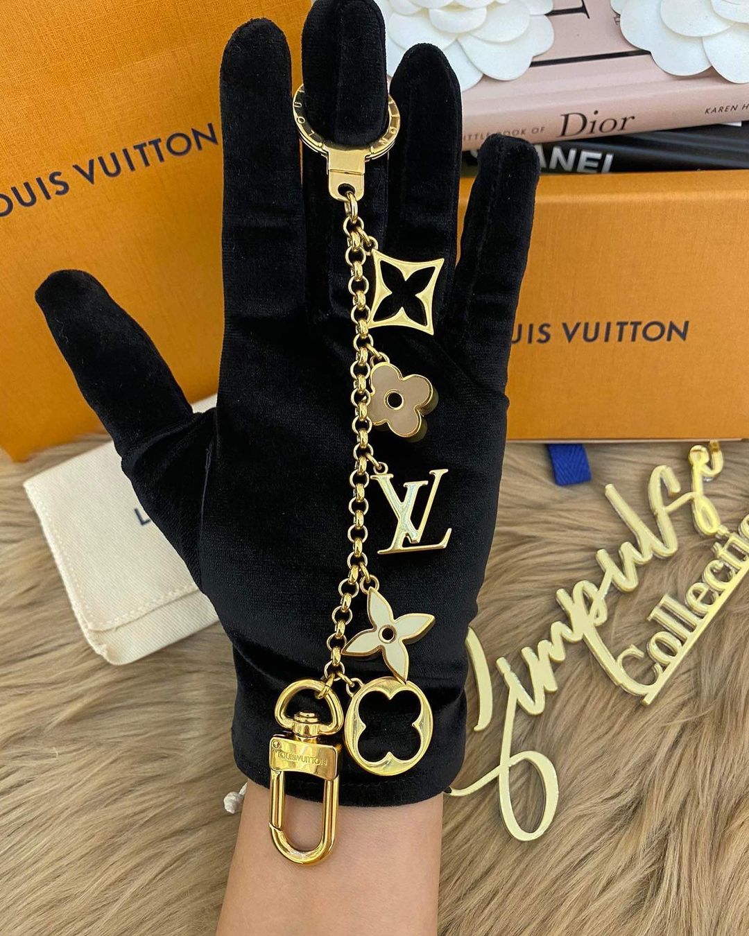 L V Fleur de monogram bag charm