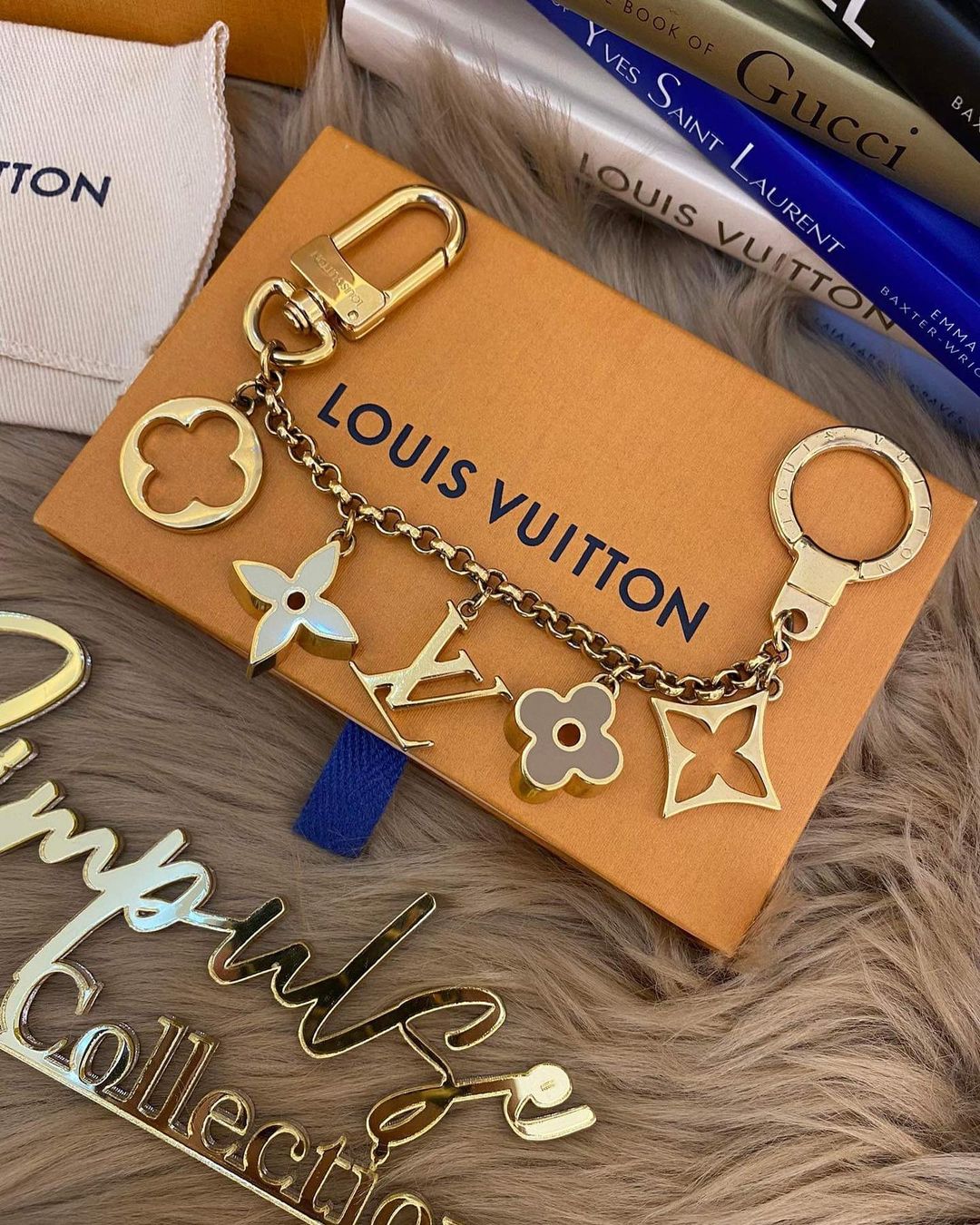 L V Fleur de monogram bag charm