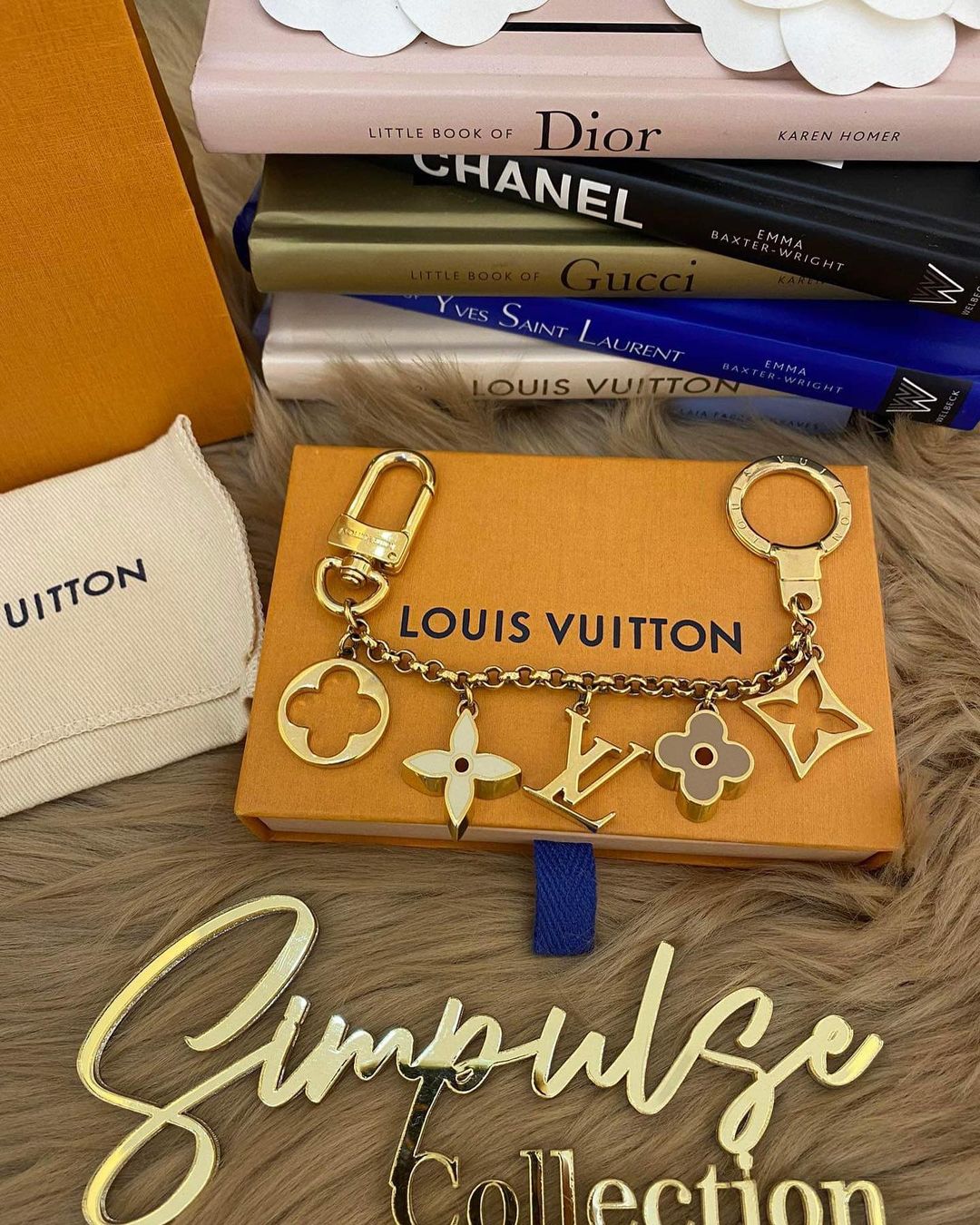 L V Fleur de monogram bag charm