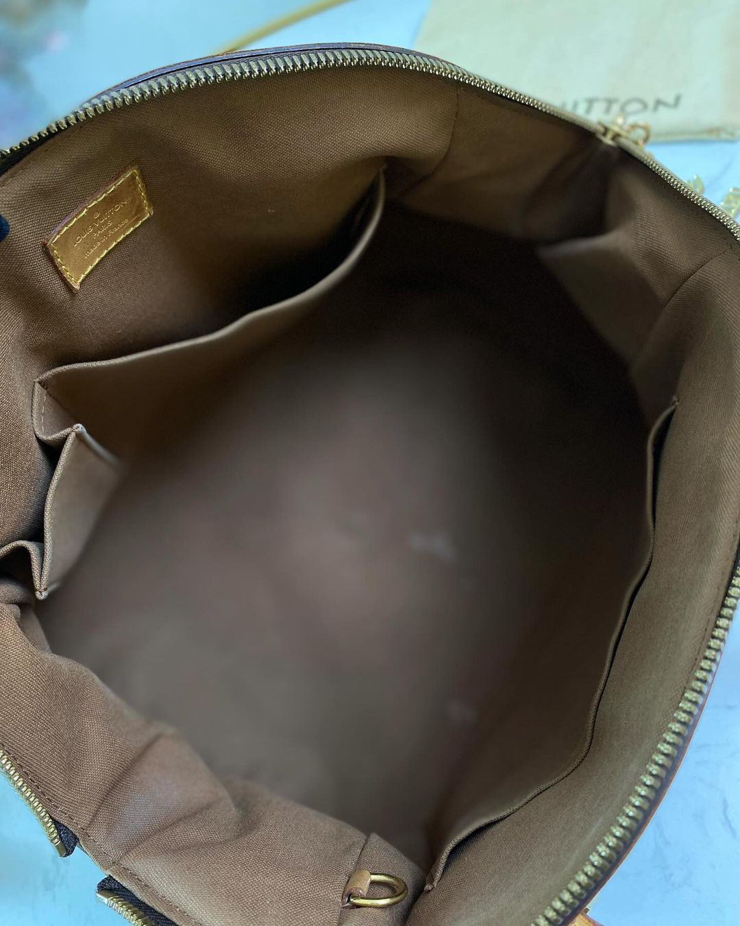 L V Tivoli Monogram GM size