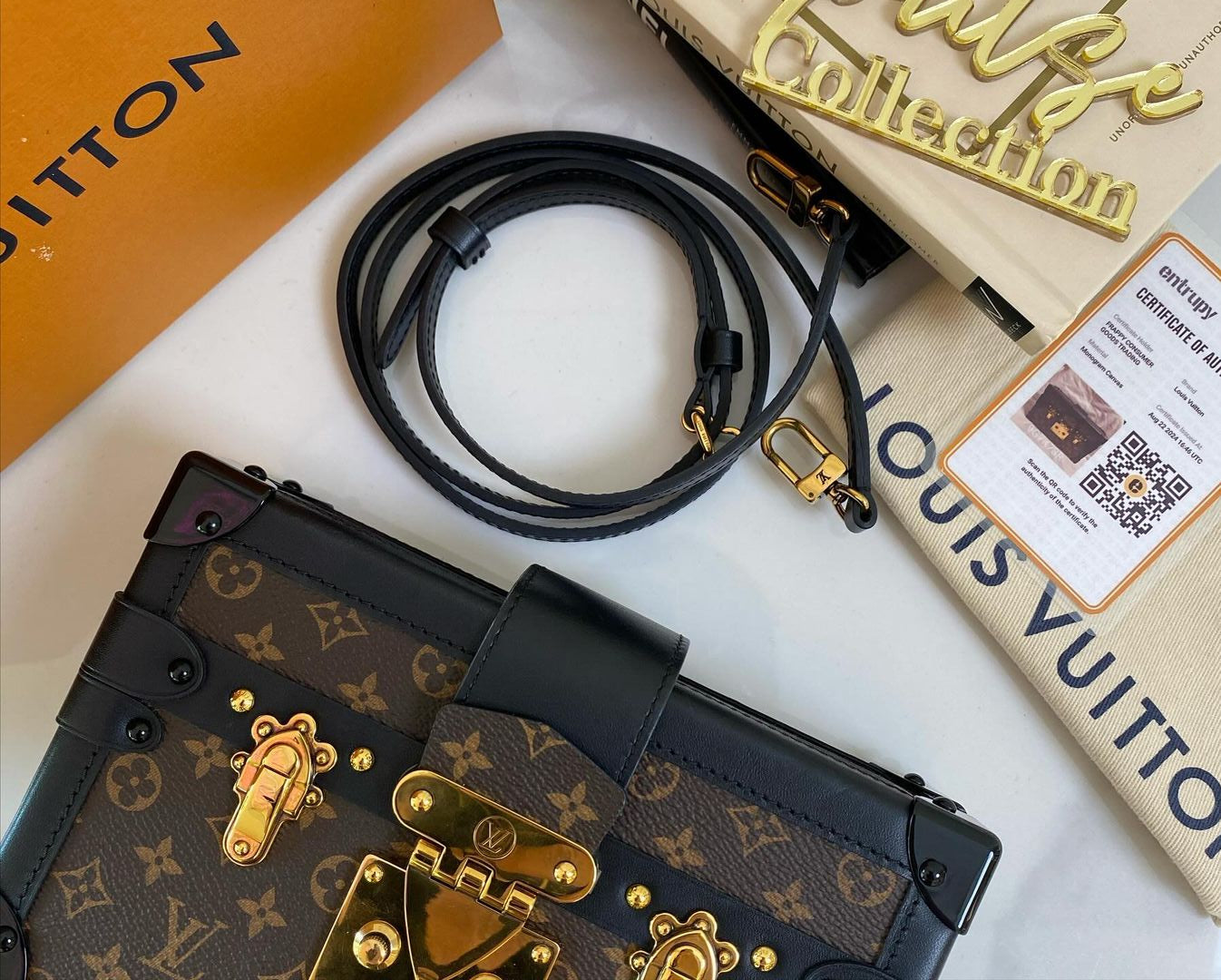 L V Petite Malle Monogram