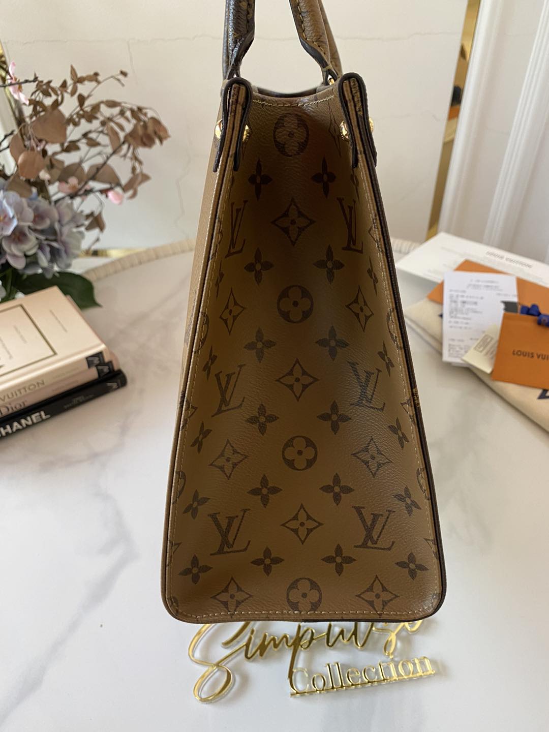 L V OTG Reverse Monogram Mm Size