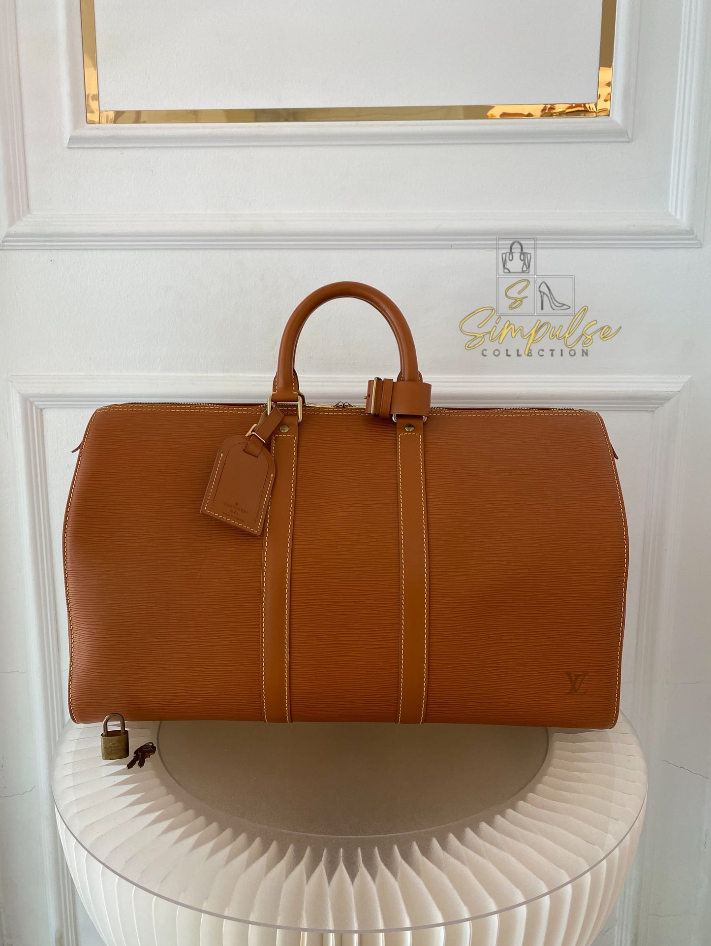 Louis Vuitton Keepall Epi Leather Cipango Gold