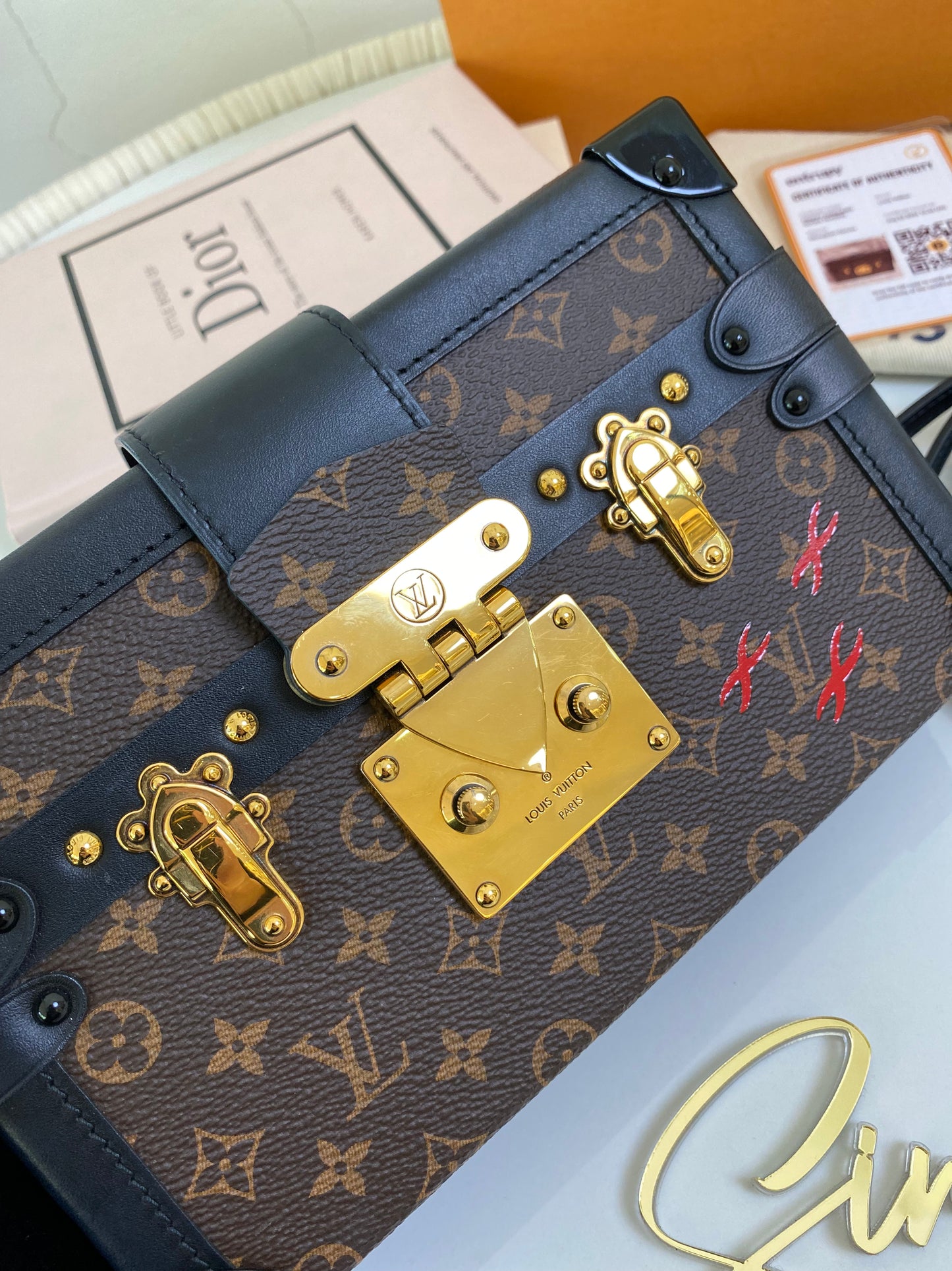 L V Petite Malle Monogram