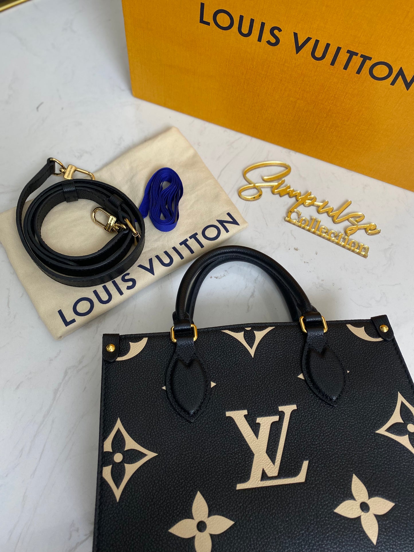 Louis Vuitton Otg Empriente Bicolor Pm Size
