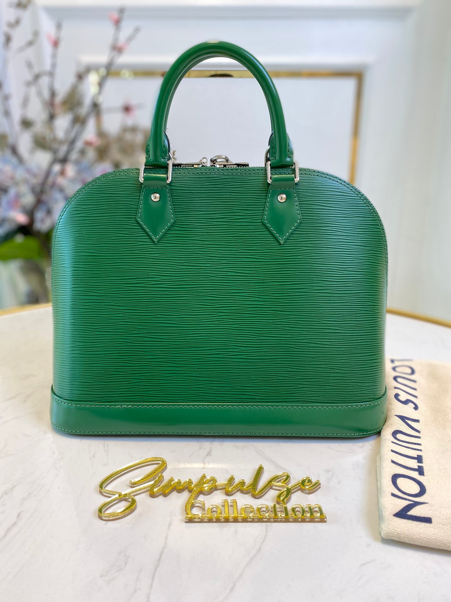 L V Menthe Epi Leather Alma