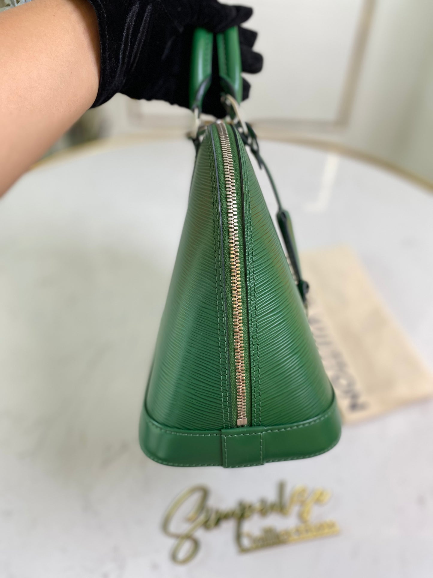L V Menthe Epi Leather Alma