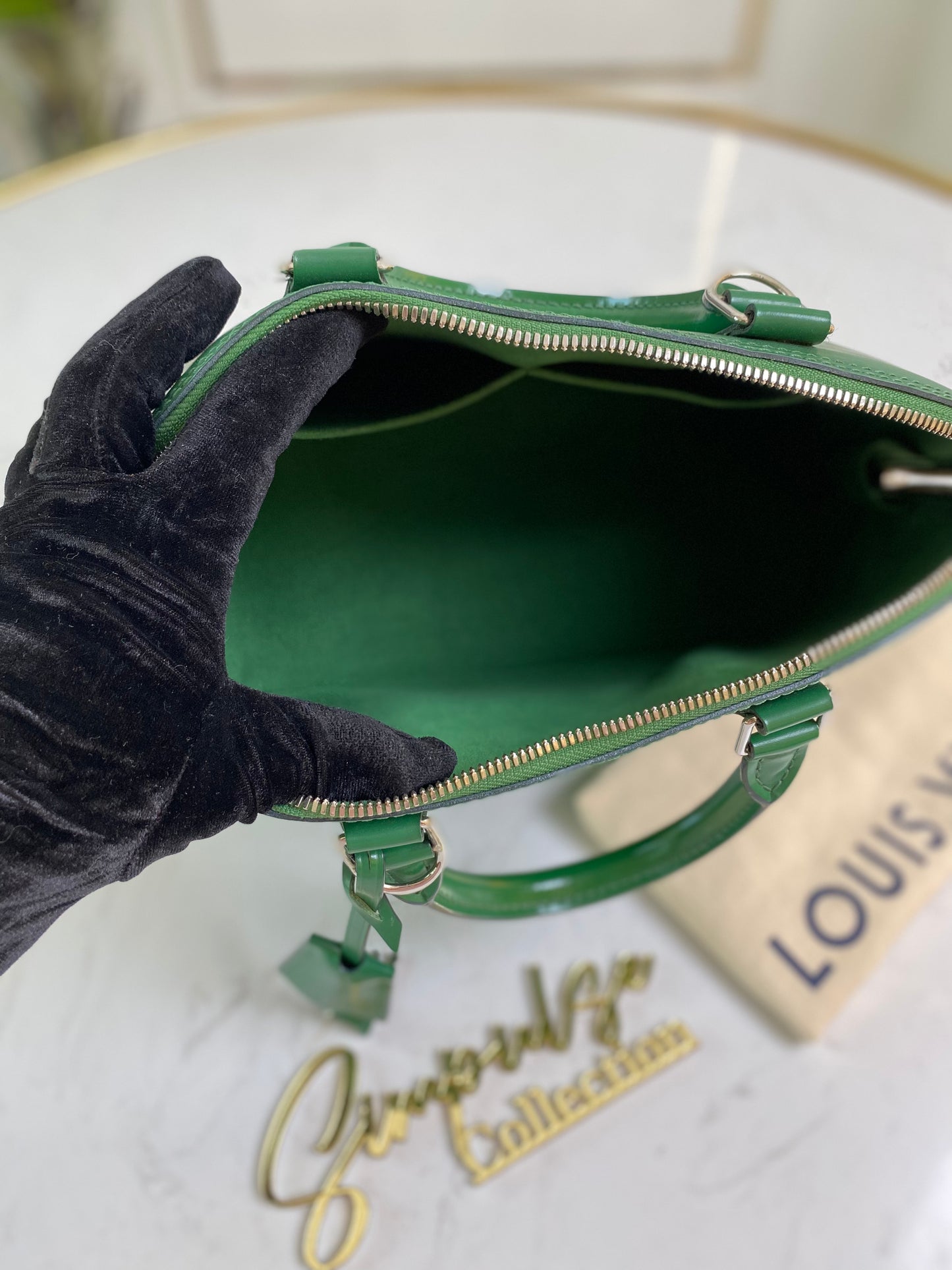 L V Menthe Epi Leather Alma