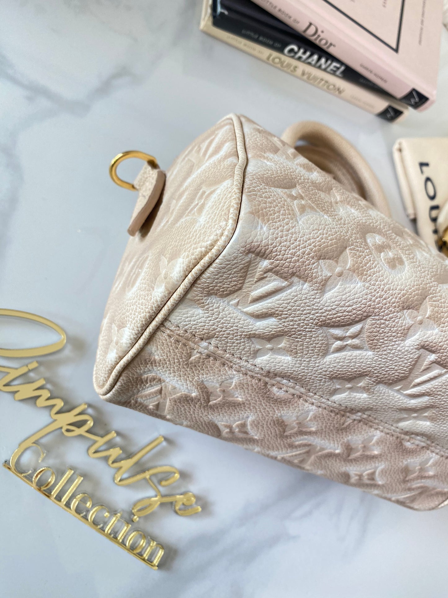 L V Speedy Bandouliere 20 Stardust Mono Empreinte Leather