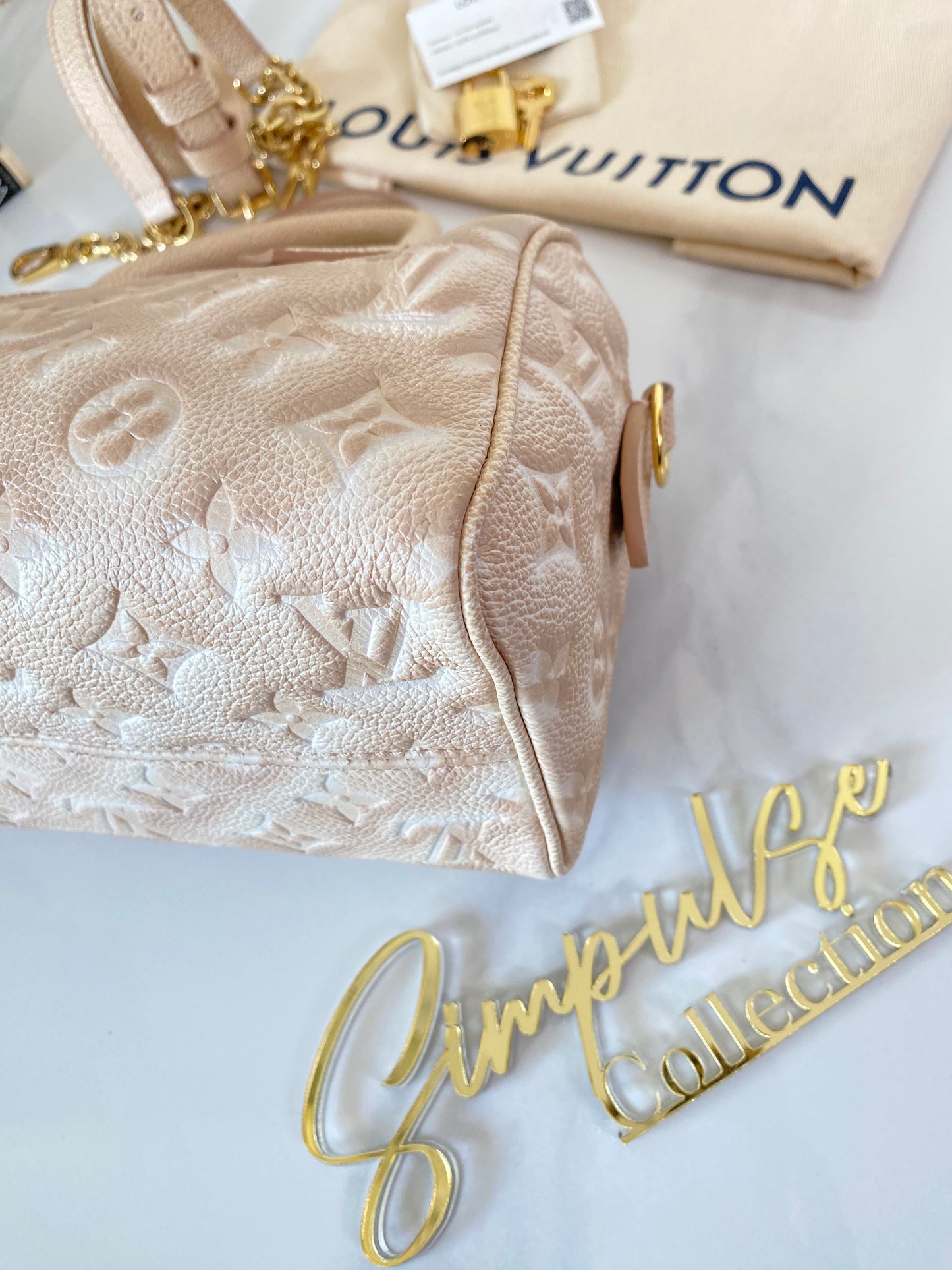 L V Speedy Bandouliere 20 Stardust Mono Empreinte Leather