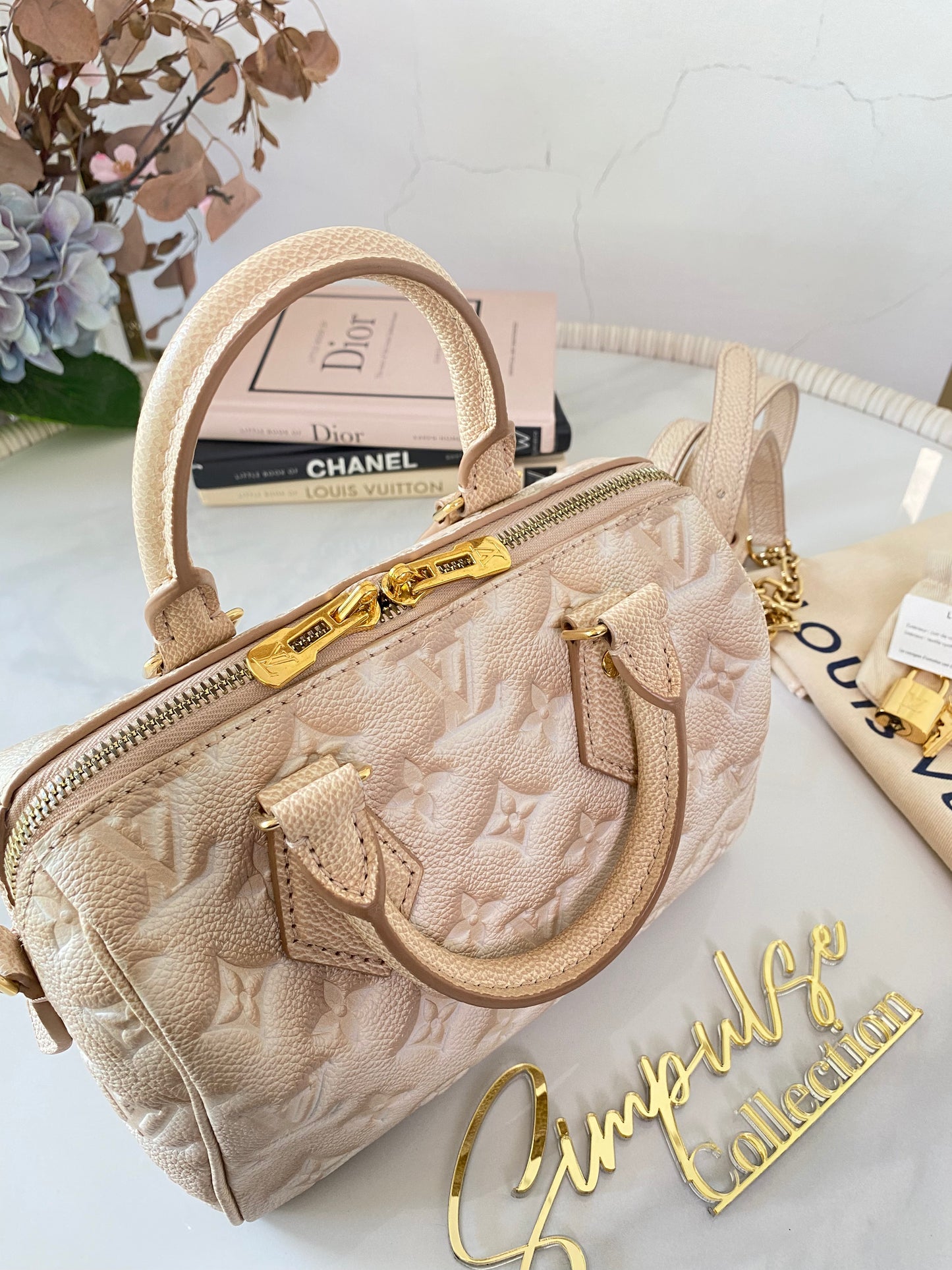 L V Speedy Bandouliere 20 Stardust Mono Empreinte Leather