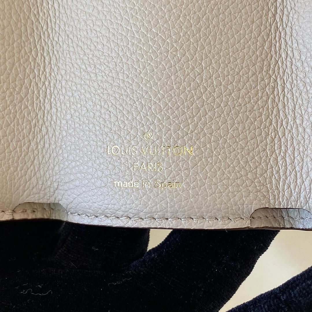Louis Vuitton Lock Mini Wallet