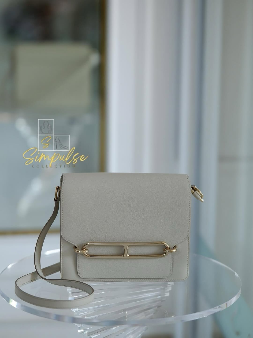 Hermes Roulis 23