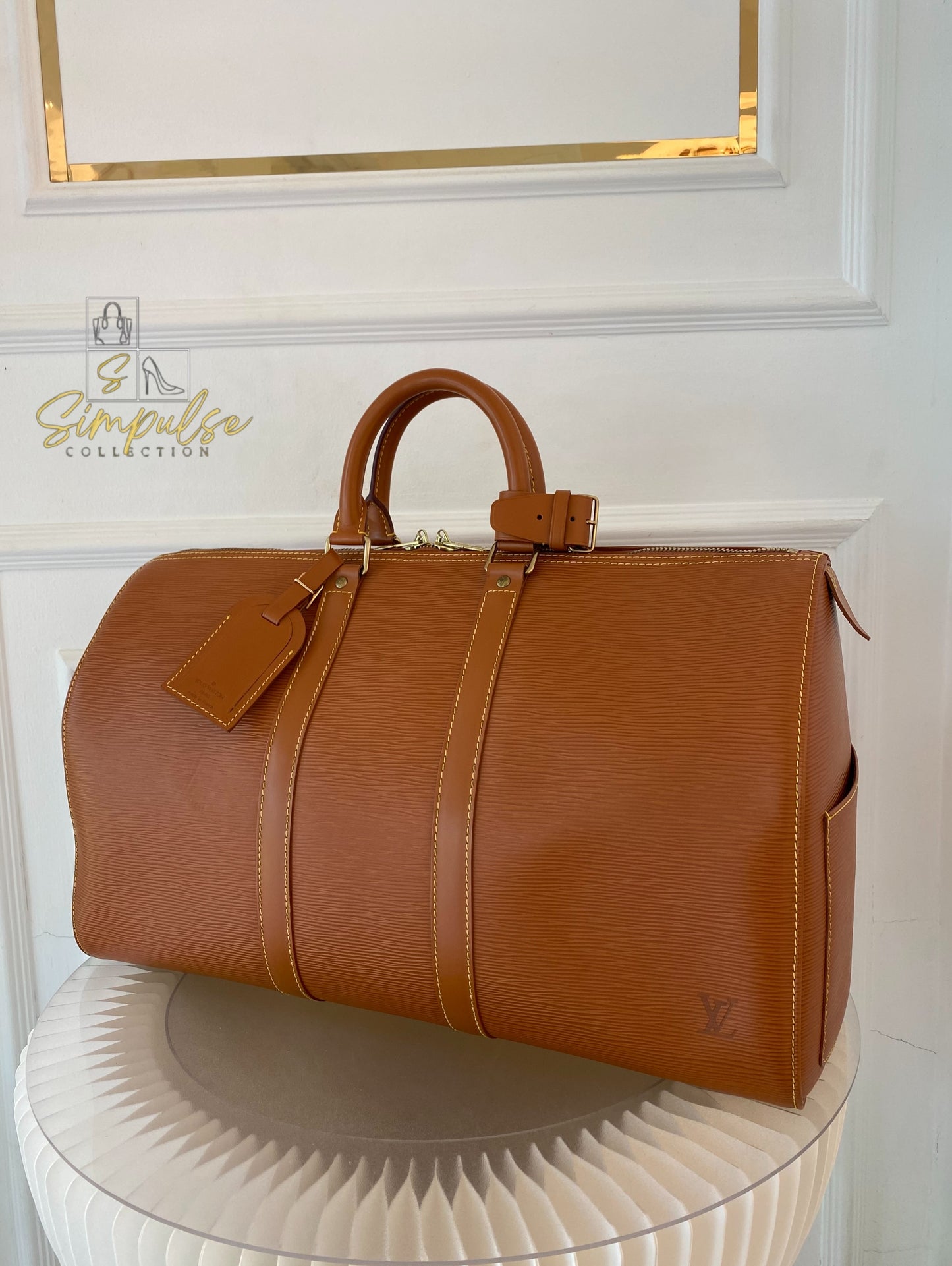 Louis Vuitton Keepall Epi Leather Cipango Gold