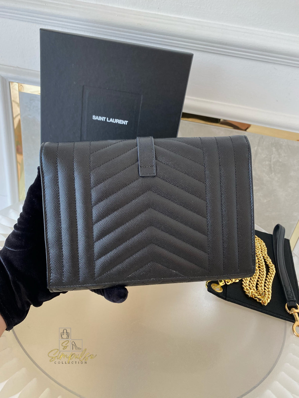 YSL ENVELOPE FLAP WRISTLET
