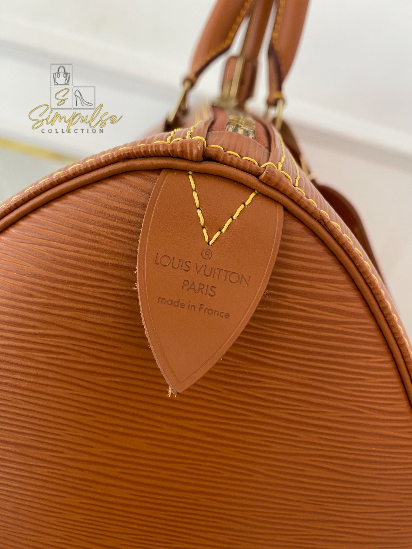 Louis Vuitton Keepall Epi Leather Cipango Gold