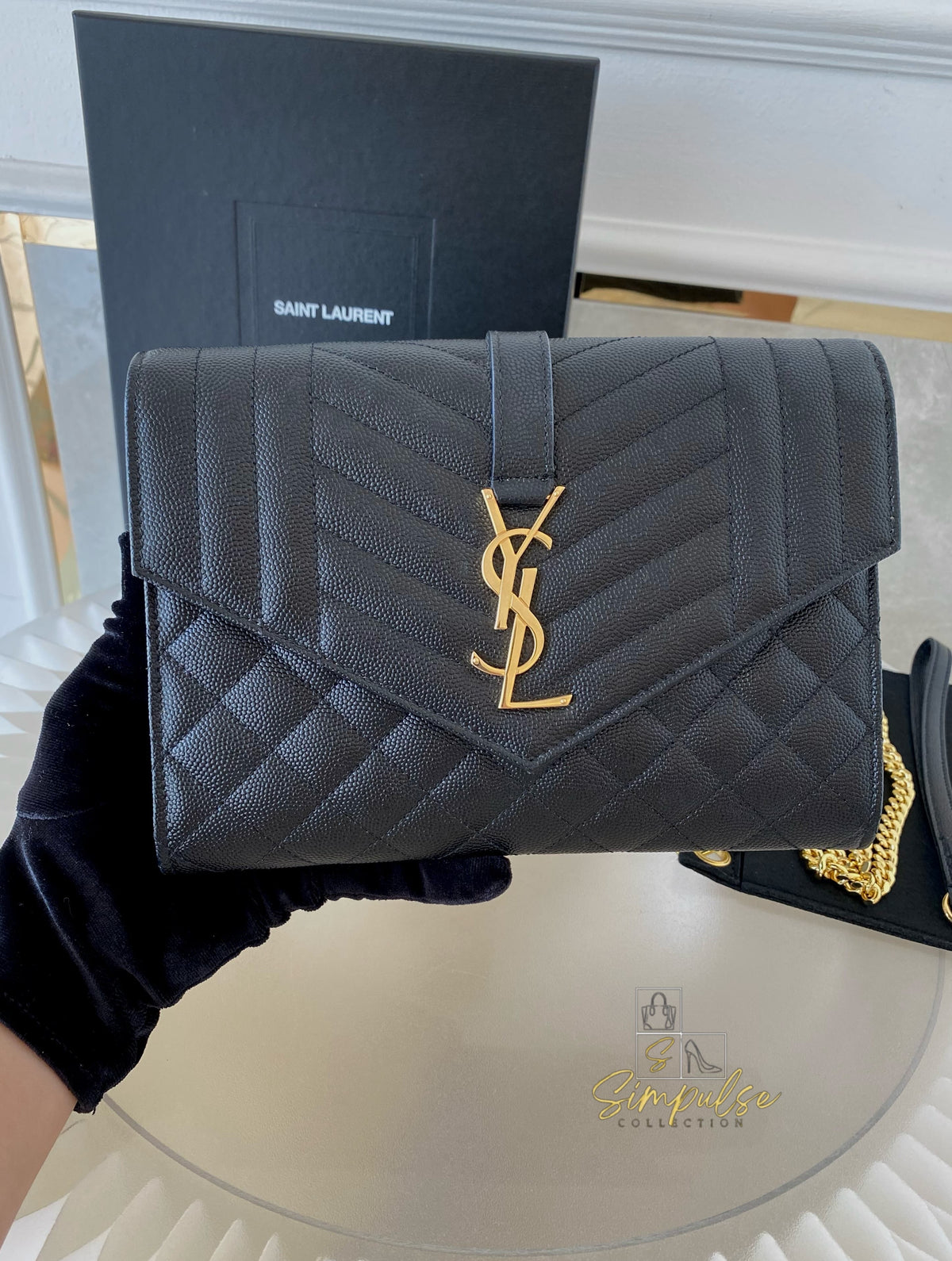 YSL ENVELOPE FLAP WRISTLET