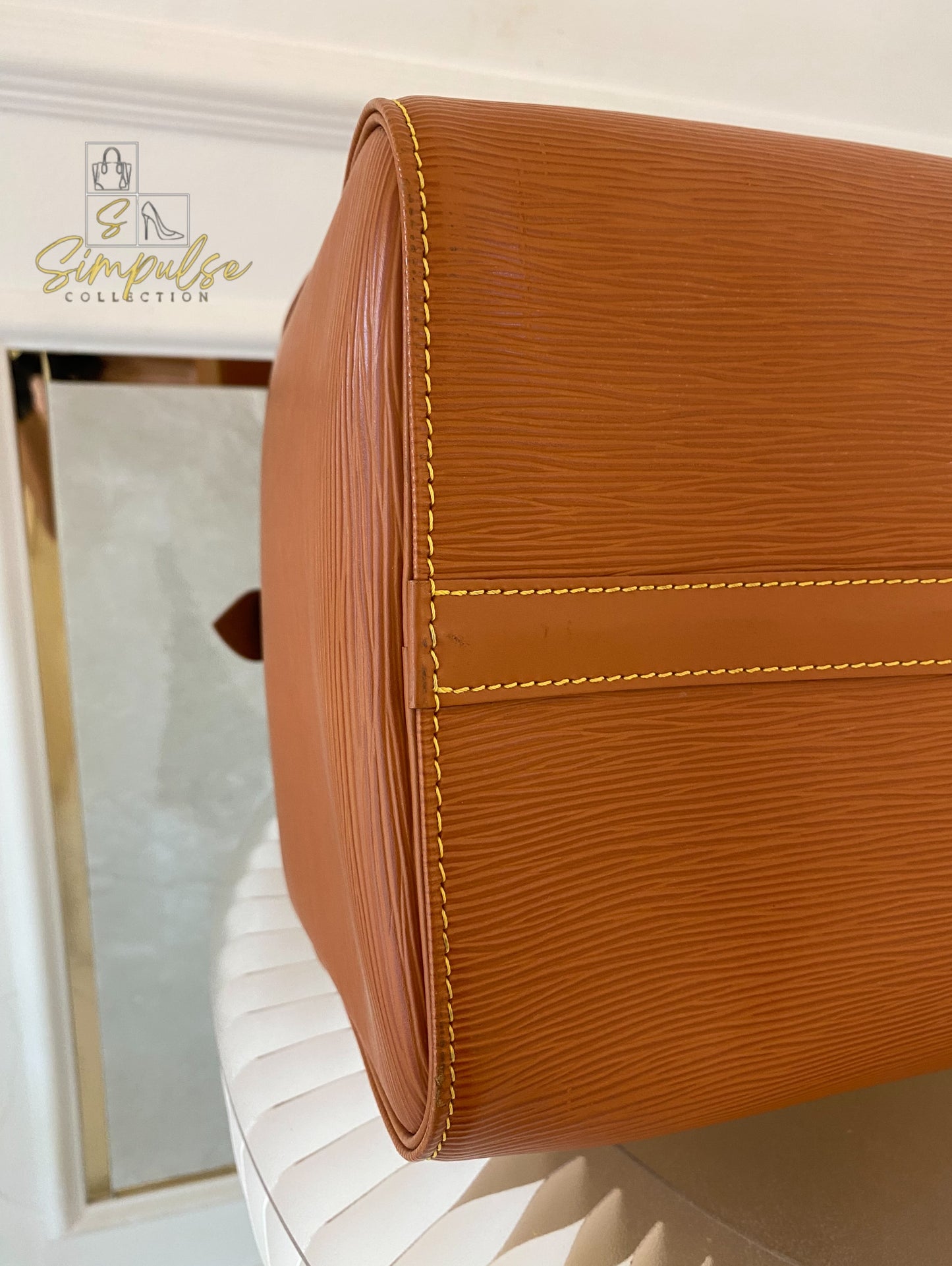 Louis Vuitton Keepall Epi Leather Cipango Gold