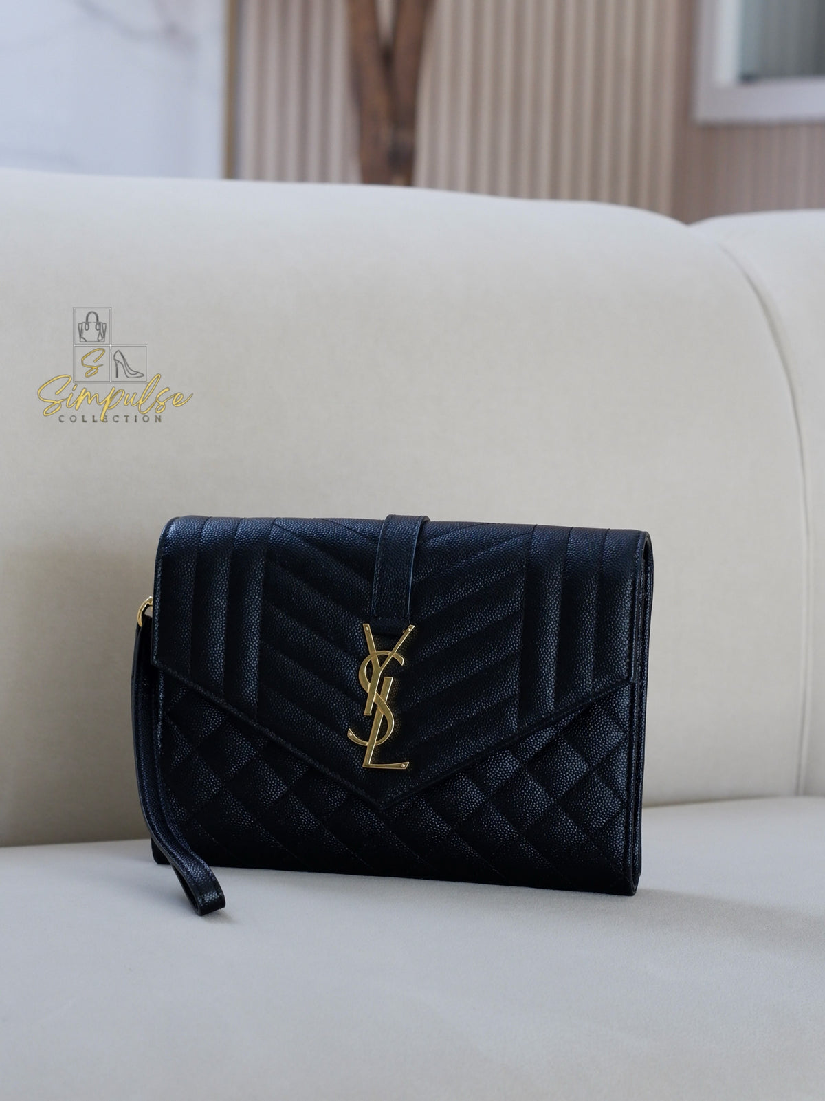 YSL ENVELOPE FLAP WRISTLET