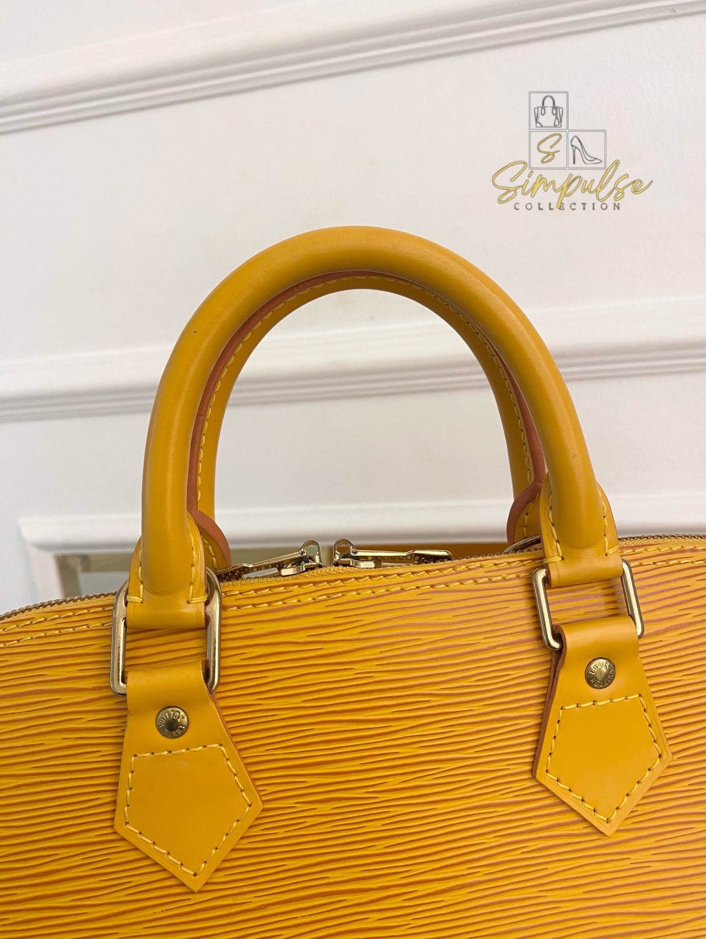Louis Vuitton Epi Alma Bag Yellow