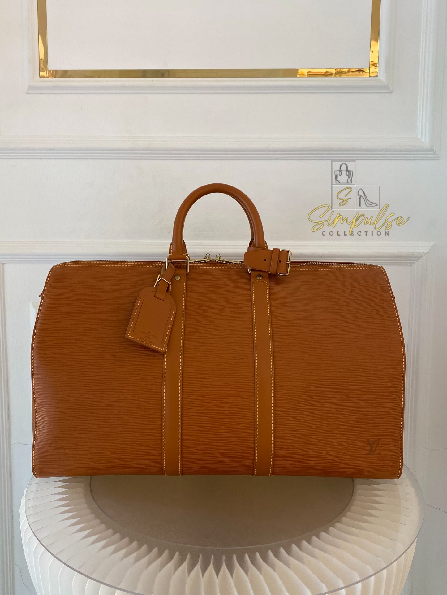 Louis Vuitton Keepall Epi Leather Cipango Gold