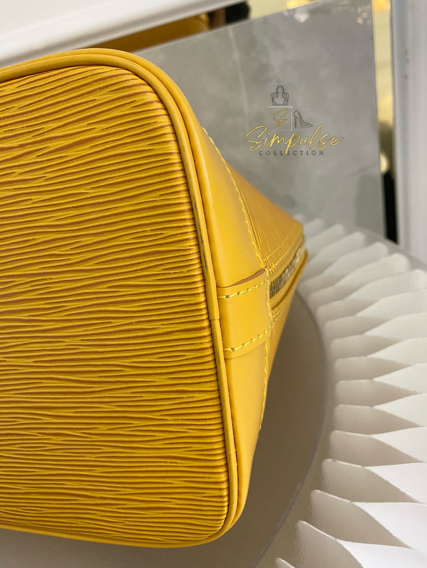 Louis Vuitton Epi Alma Bag Yellow