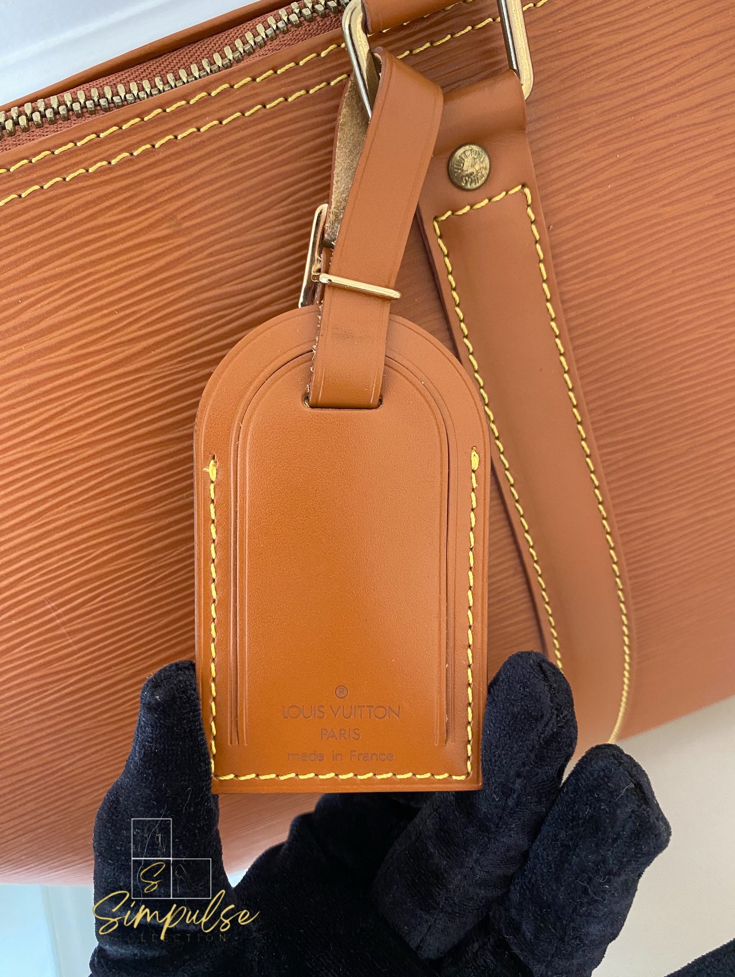 Louis Vuitton Keepall Epi Leather Cipango Gold