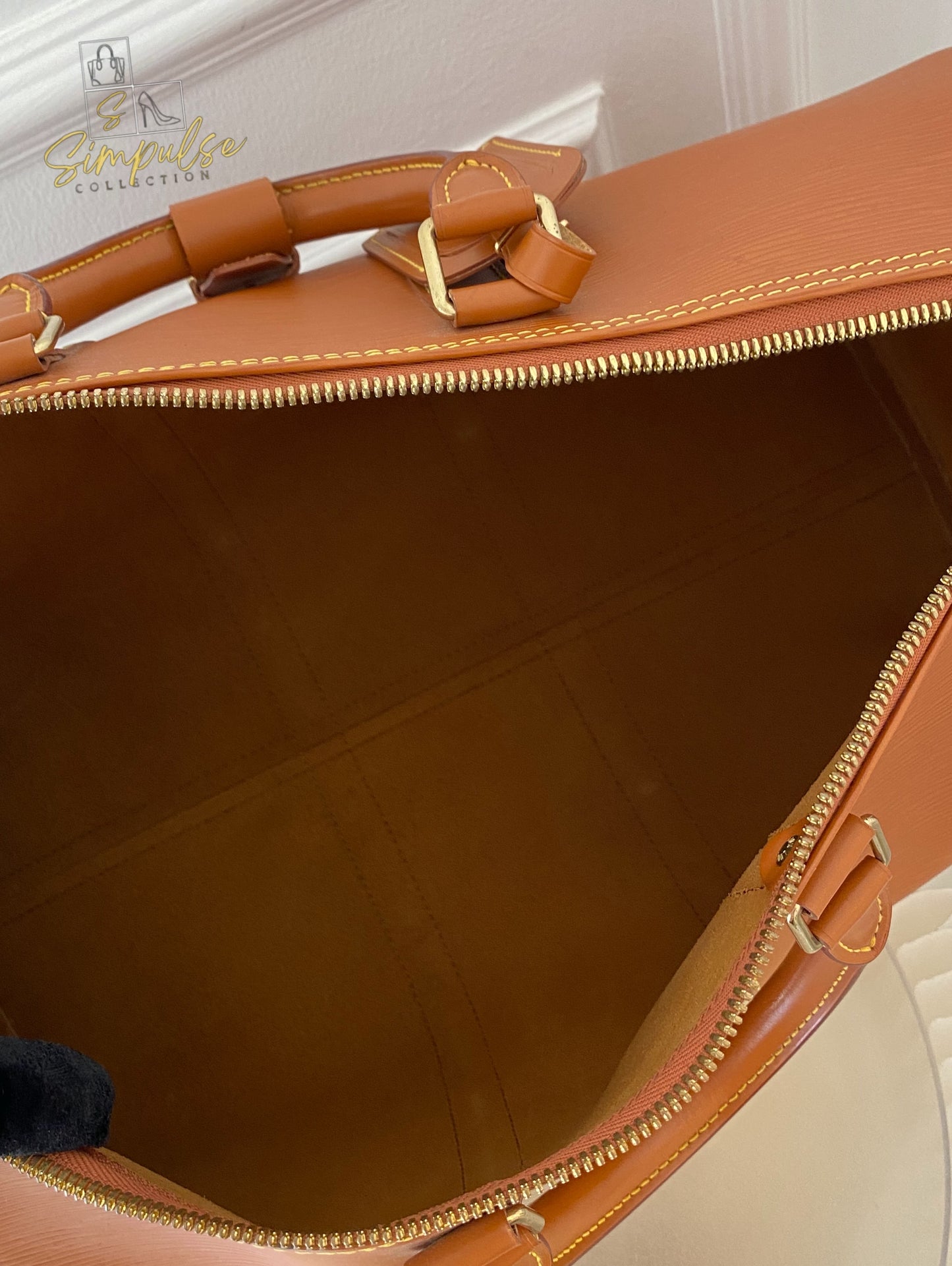 Louis Vuitton Keepall Epi Leather Cipango Gold
