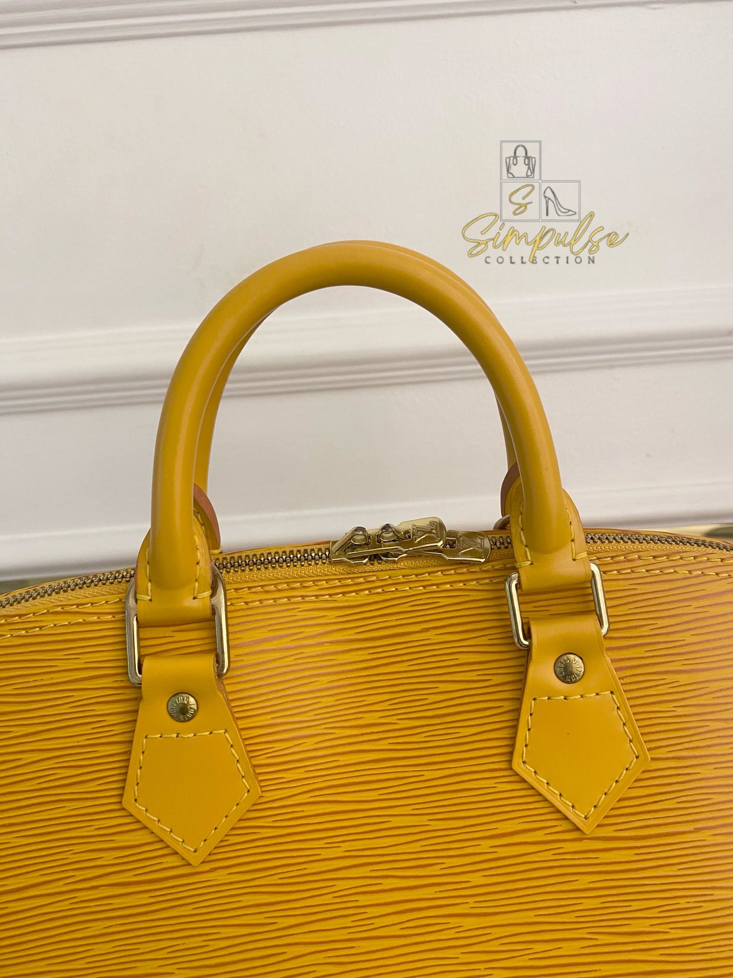 Louis Vuitton Epi Alma Bag Yellow