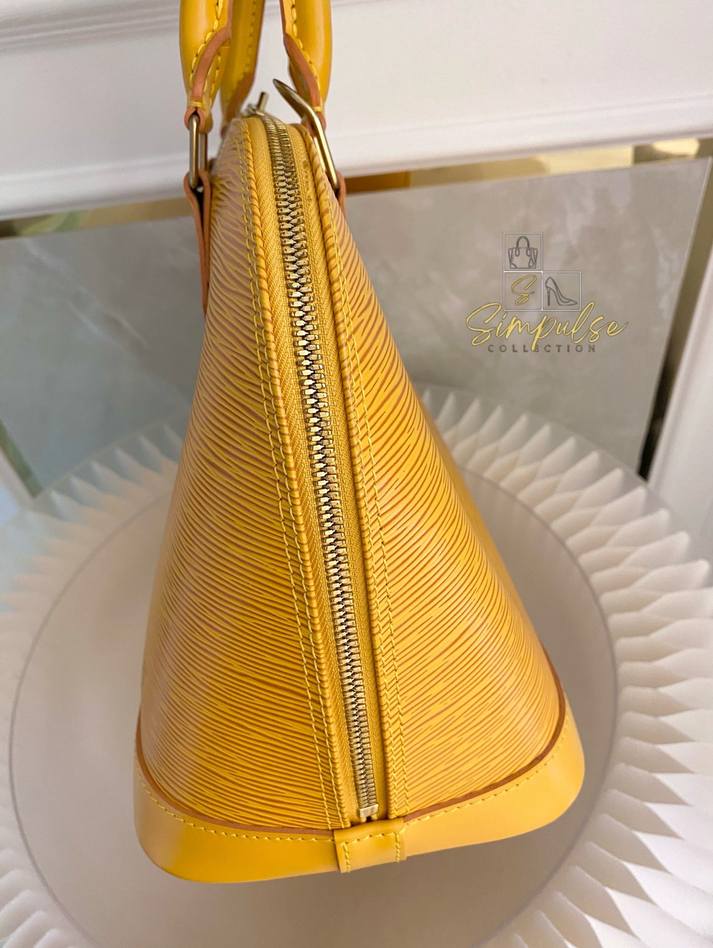 Louis Vuitton Epi Alma Bag Yellow