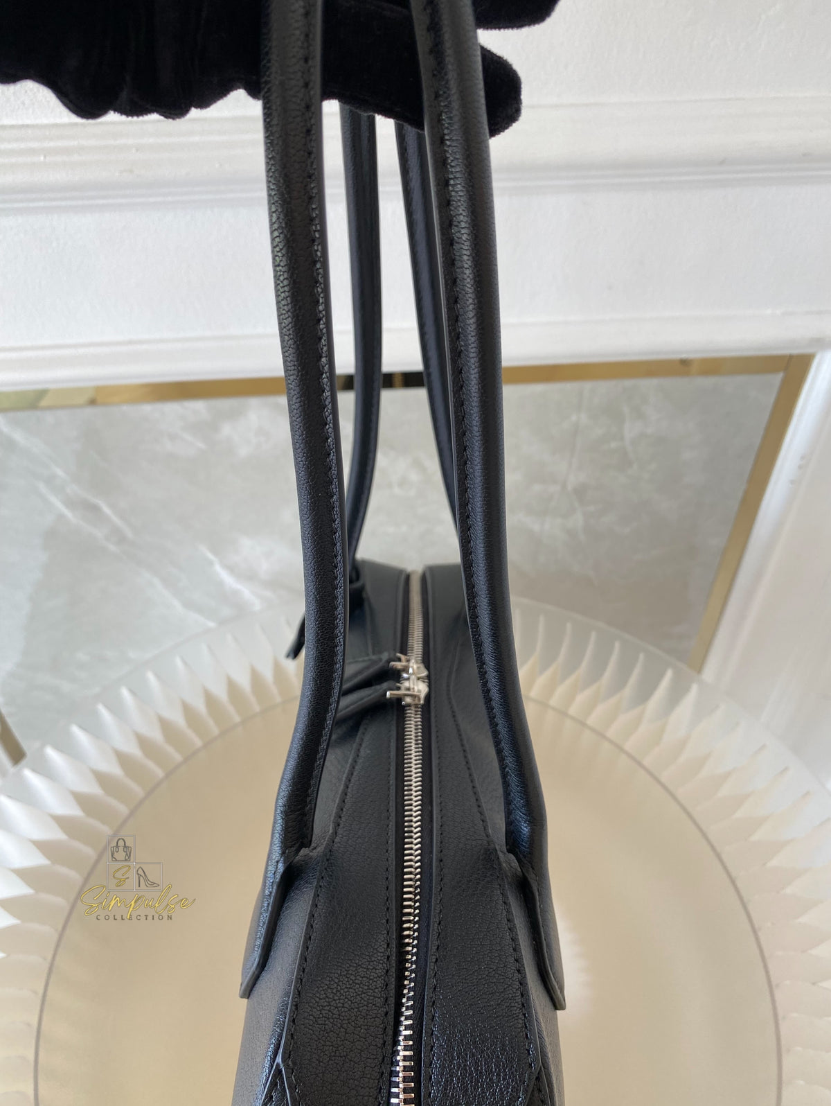 ALAIA LE TECKEL MEDIUM BAG IN GOATSKIN IN BLACK