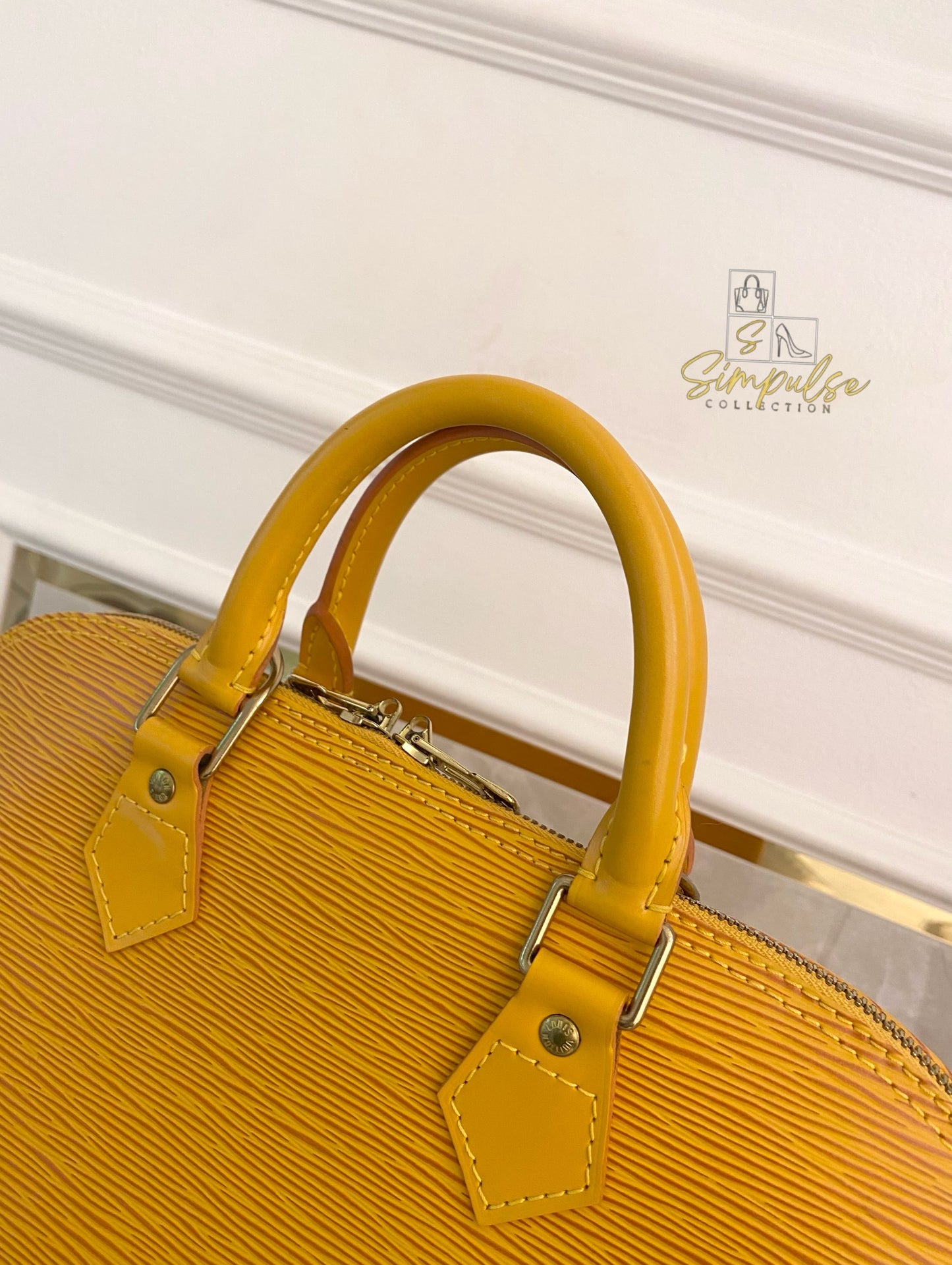 Louis Vuitton Epi Alma Bag Yellow