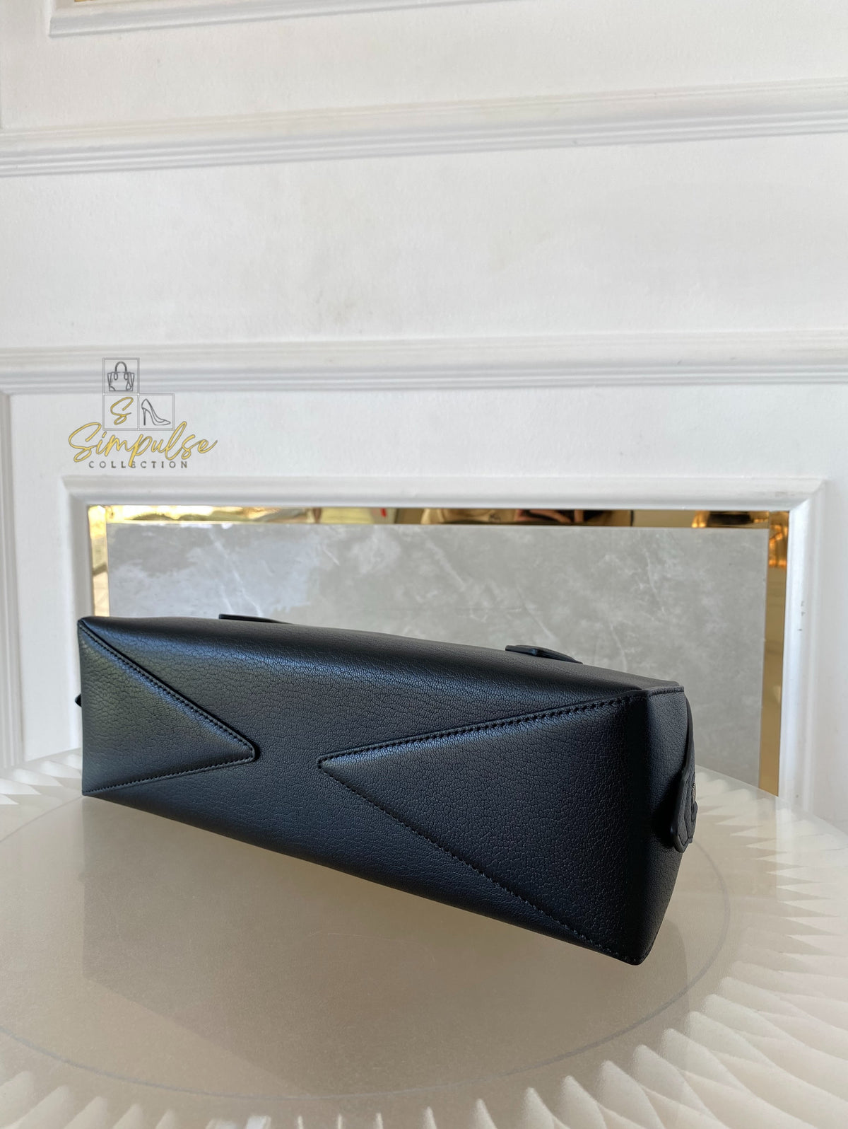 ALAIA LE TECKEL MEDIUM BAG IN GOATSKIN IN BLACK