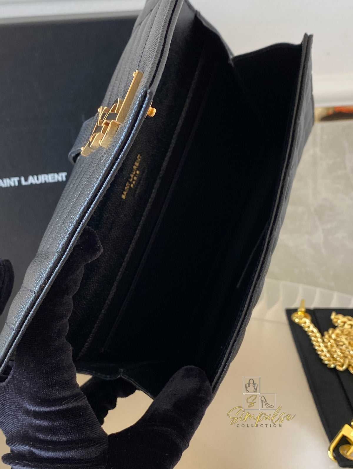 YSL ENVELOPE FLAP WRISTLET
