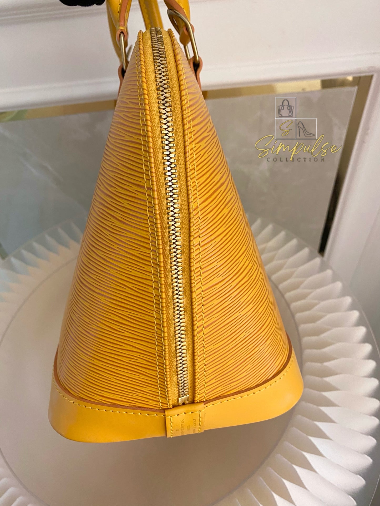 Louis Vuitton Epi Alma Bag Yellow