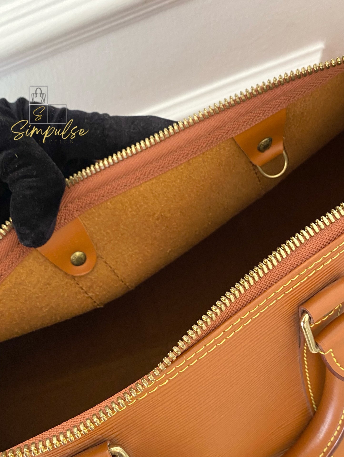 Louis Vuitton Keepall Epi Leather Cipango Gold