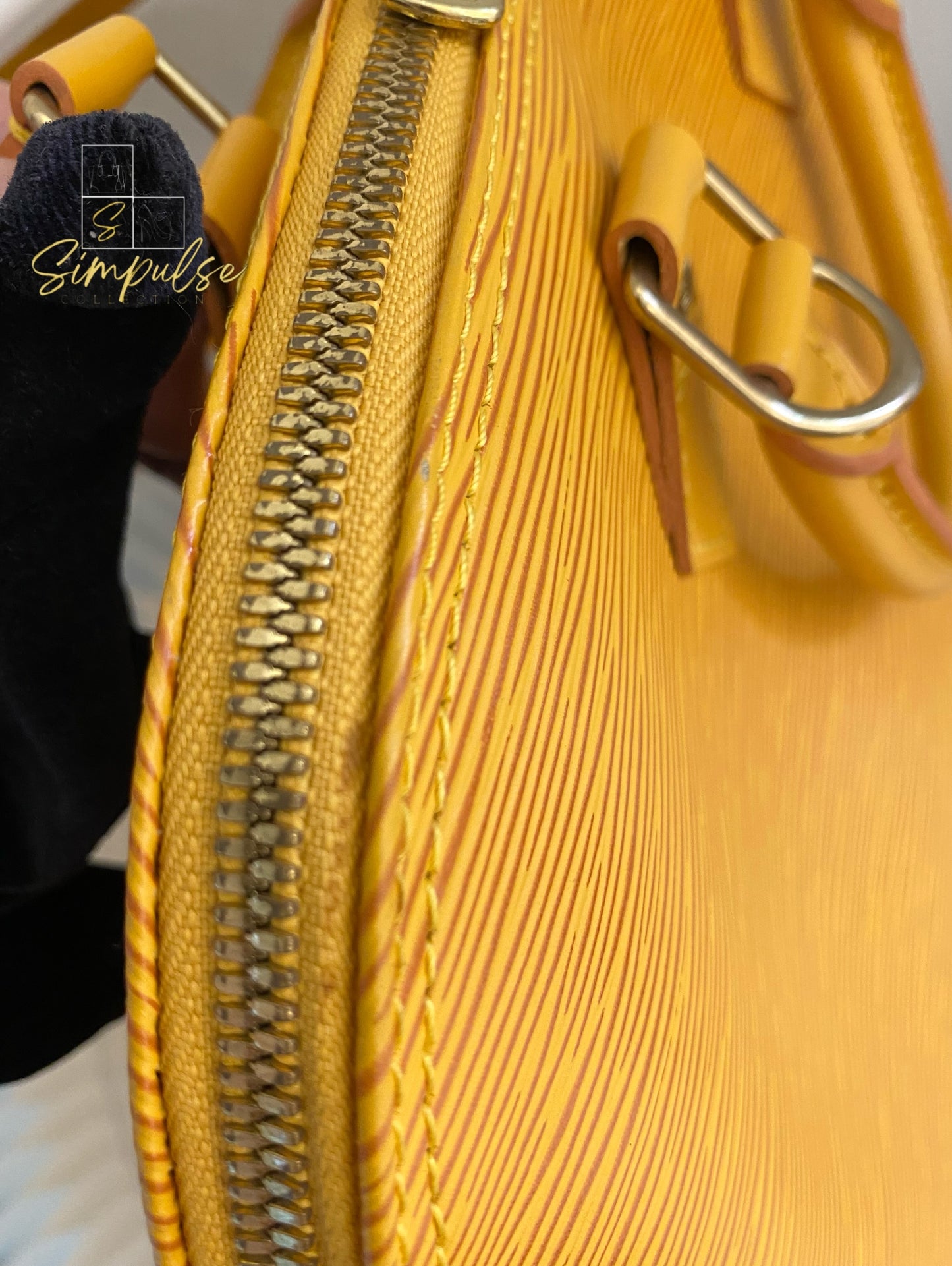 Louis Vuitton Epi Alma Bag Yellow