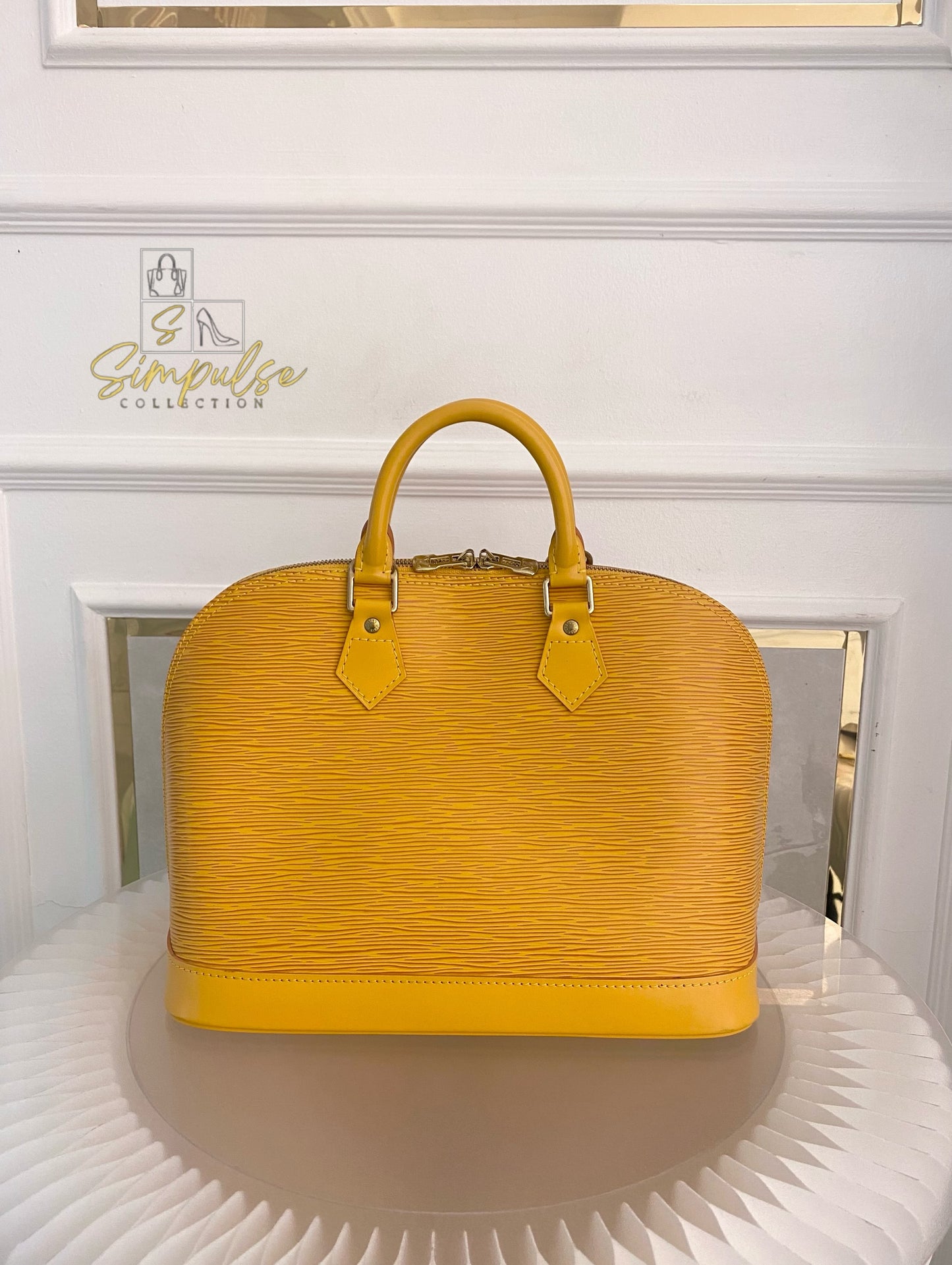 Louis Vuitton Epi Alma Bag Yellow