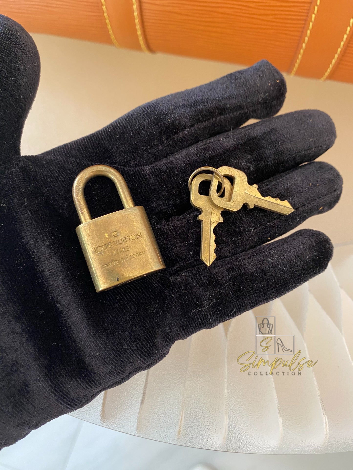 Louis Vuitton Keepall Epi Leather Cipango Gold
