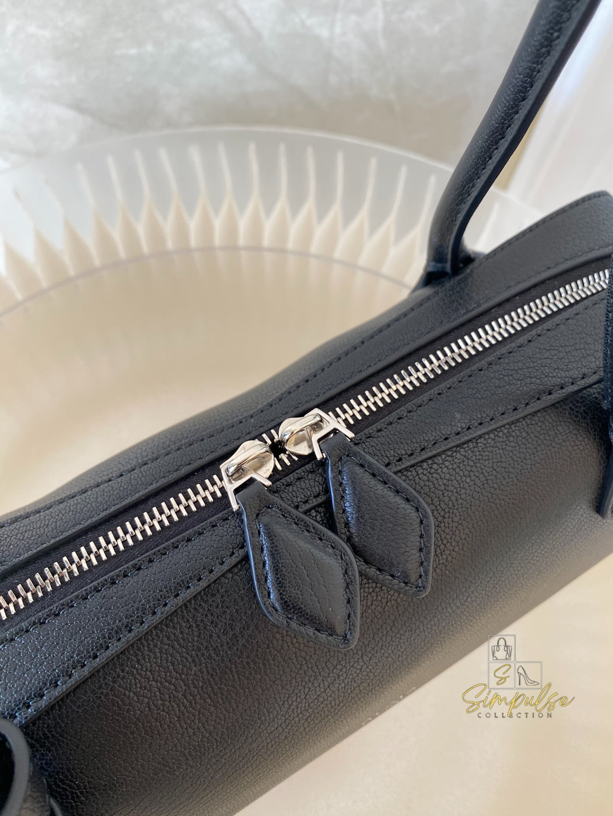 ALAIA LE TECKEL MEDIUM BAG IN GOATSKIN IN BLACK