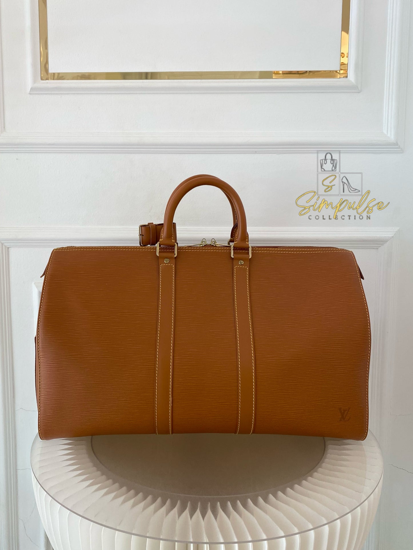 Louis Vuitton Keepall Epi Leather Cipango Gold