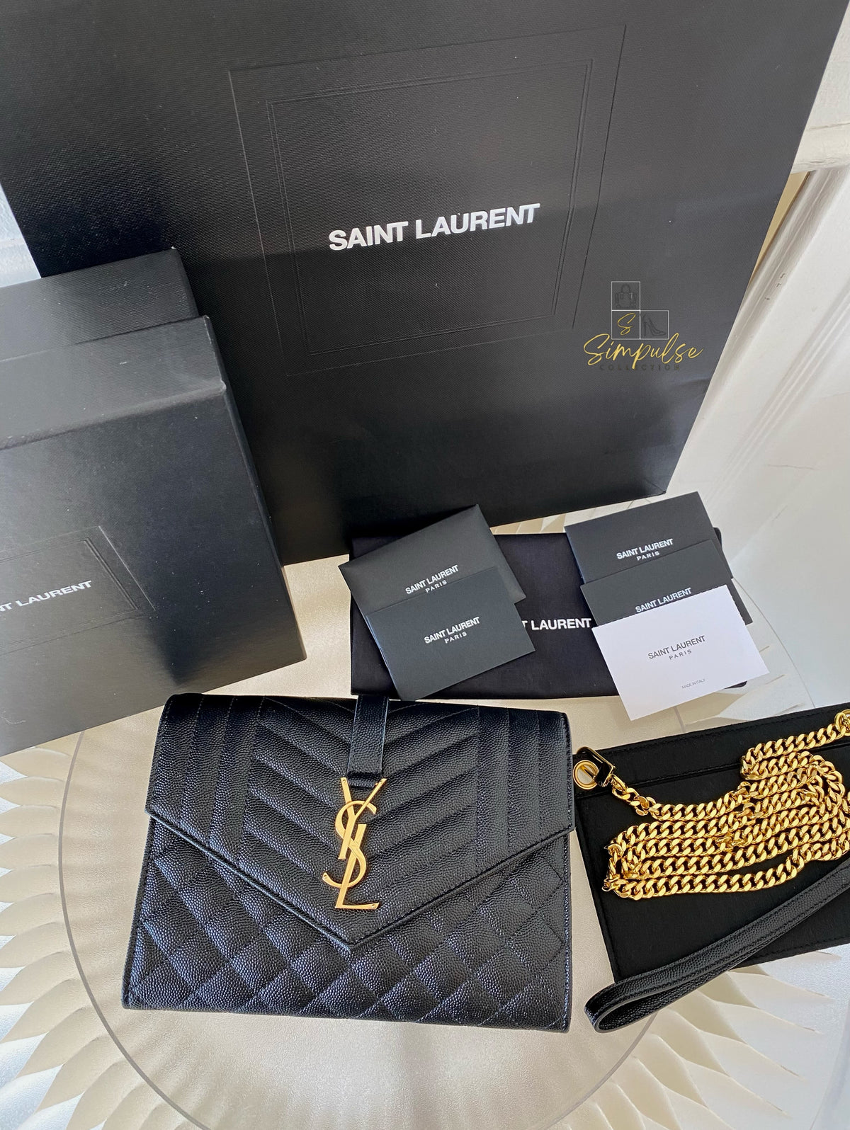 YSL ENVELOPE FLAP WRISTLET