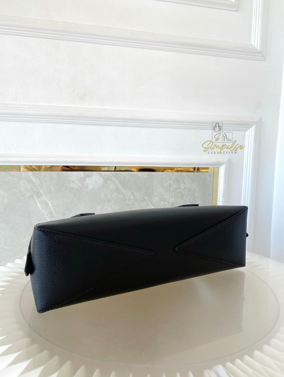 ALAIA LE TECKEL MEDIUM BAG IN GOATSKIN IN BLACK