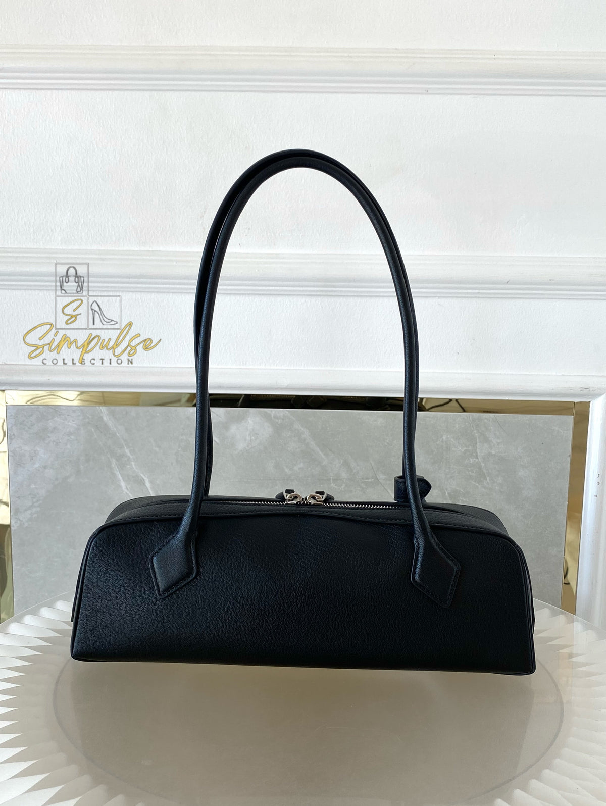 ALAIA LE TECKEL MEDIUM BAG IN GOATSKIN IN BLACK