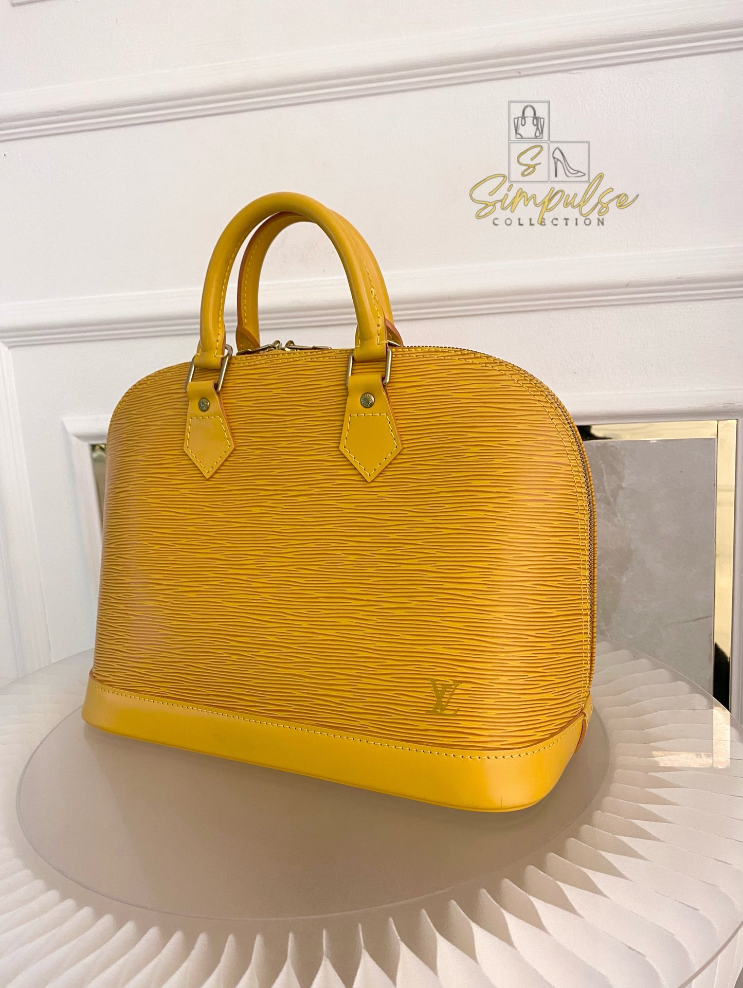 Louis Vuitton Epi Alma Bag Yellow