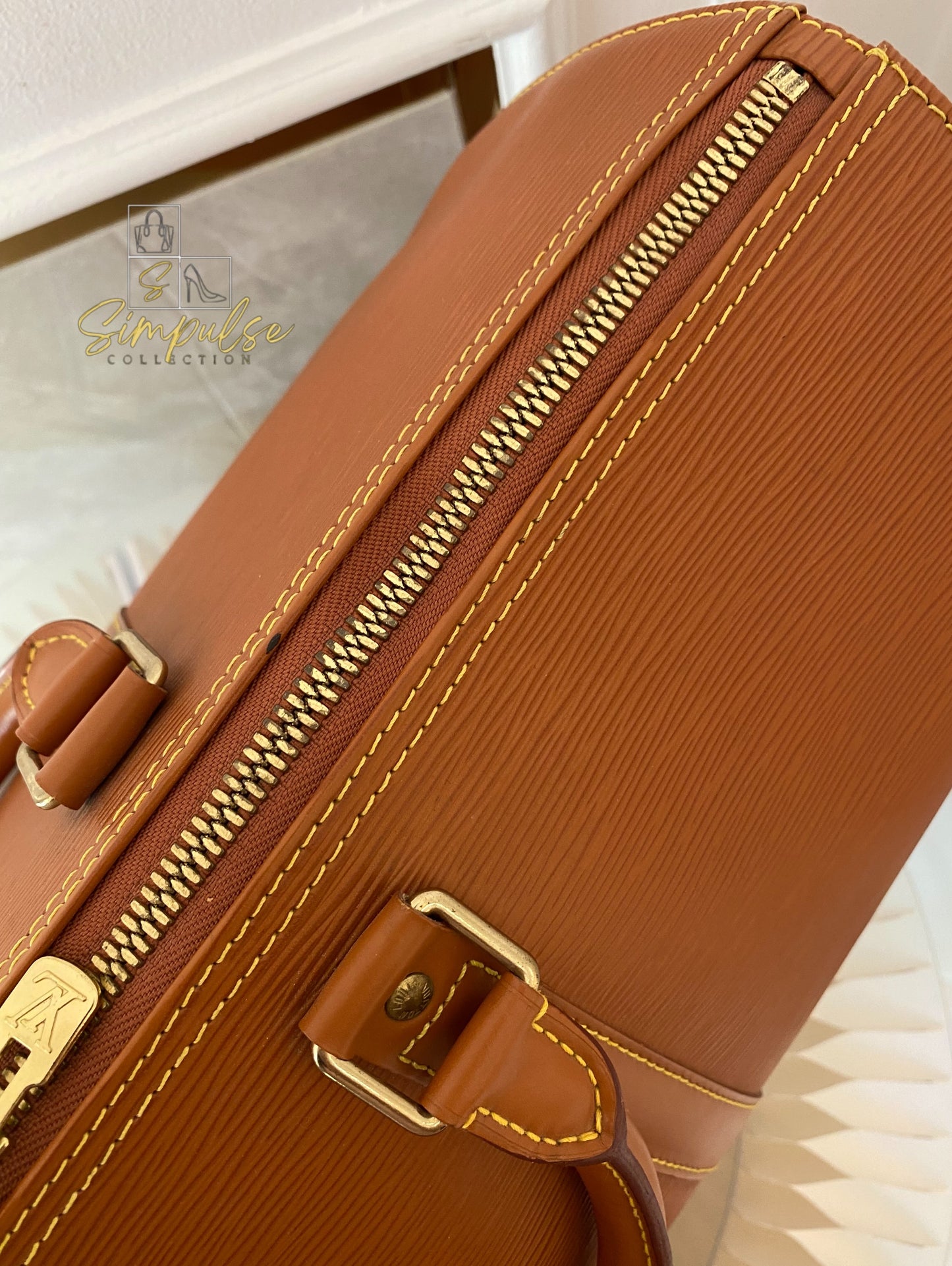 Louis Vuitton Keepall Epi Leather Cipango Gold