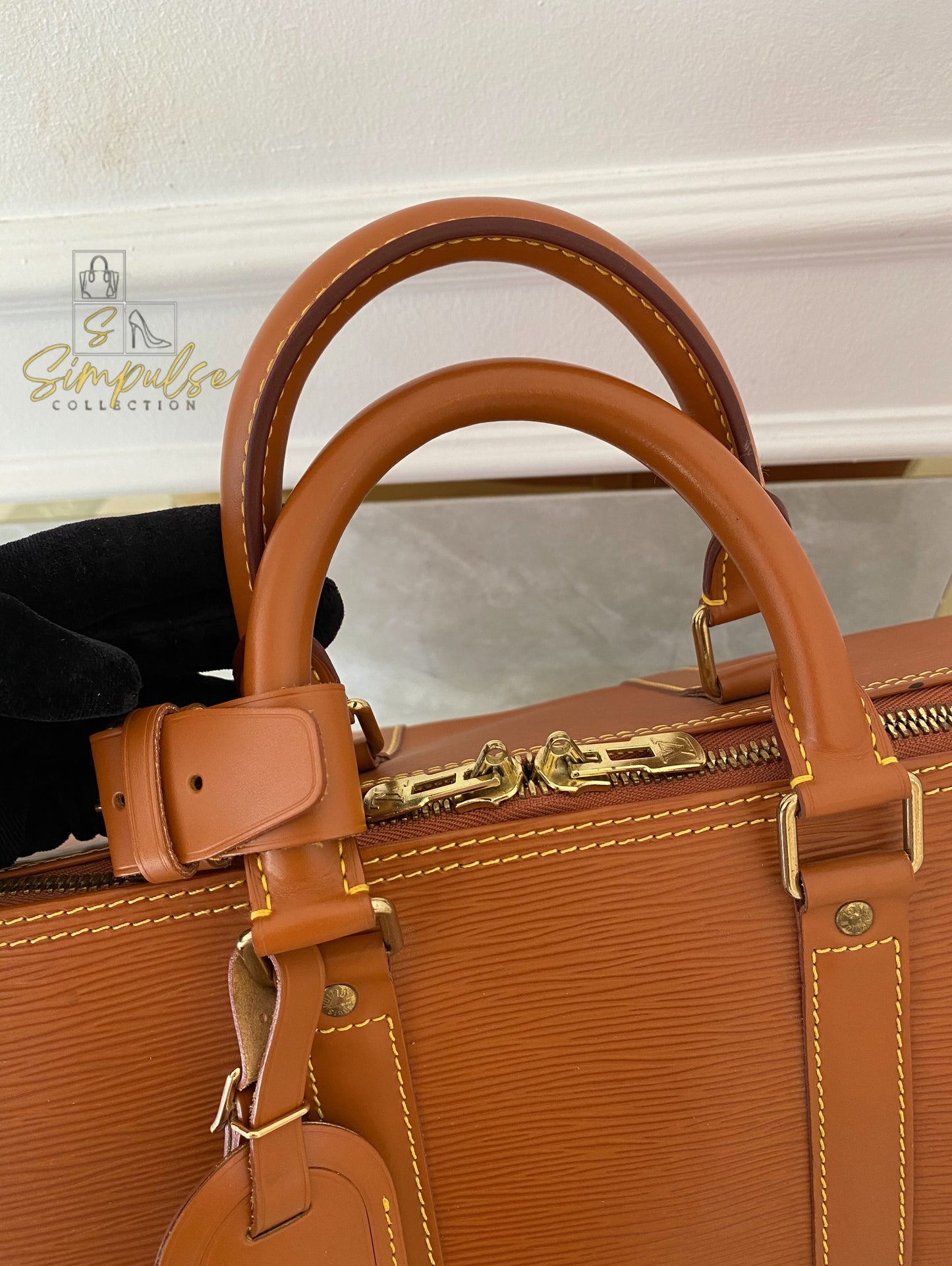 Louis Vuitton Keepall Epi Leather Cipango Gold