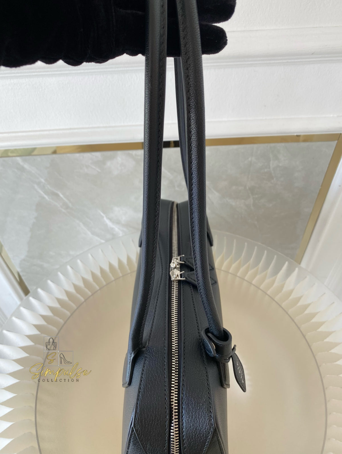 ALAIA LE TECKEL MEDIUM BAG IN GOATSKIN IN BLACK