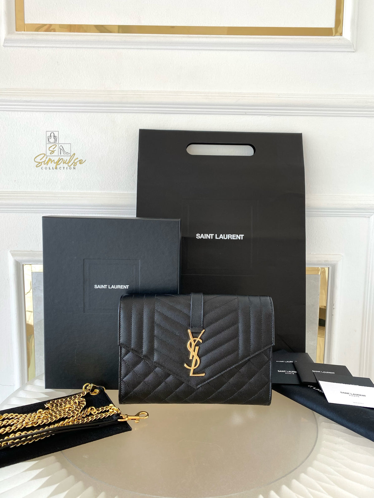 YSL ENVELOPE FLAP WRISTLET