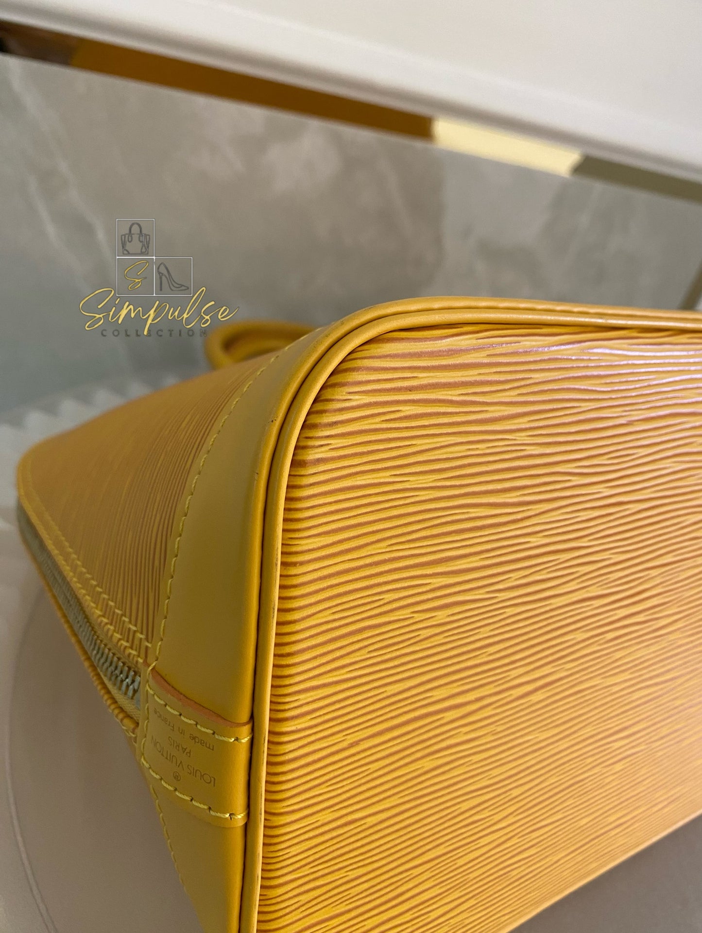Louis Vuitton Epi Alma Bag Yellow